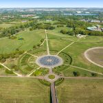 Aerial view of expansive park landscape with pathways.