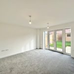 Bright living room with patio doors.