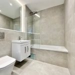 Modern bathroom with bathtub and sleek design