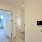 Bright apartment interior with wooden floors.