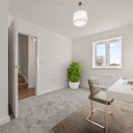 Modern home office with desk and plant