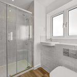 Modern bathroom with glass shower enclosure