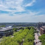 Urban landscape with modern buildings and greenery.