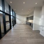 Modern open-plan kitchen with large windows