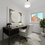 Modern home office with desk and decor.