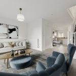 Modern living room with staircase and artwork.