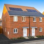 Modern semi-detached houses with solar panels