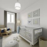 Minimalist nursery with cot and rocking chair.