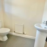 Modern bathroom with toilet and sink