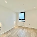 Minimalist room with window view, wooden floor