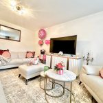 Cosy living room with sofas and decor.