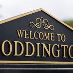 Welcome to Toddington sign with ornate design.