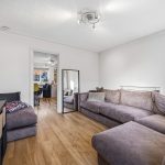 Cosy living room with large corner sofa.