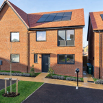 Modern brick house with solar panels