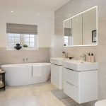 Modern bathroom with bath, sinks, and mirror.