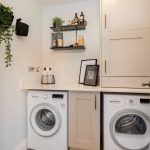 Modern utility room with efficient washer and dryer.