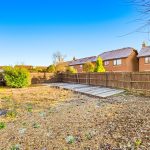 Back garden with patio and wooden decking