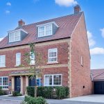 Newly built red brick suburban house for sale.