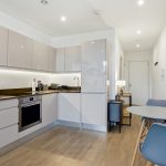 Modern kitchen with table and chairs