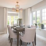 Bright dining room with elegant table setting.