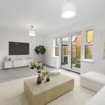 Modern living room with large windows and decor.