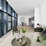 Modern open-plan living room with kitchen and decor.