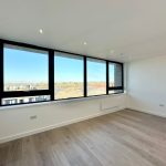 Bright empty room with large window view