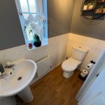 Modern bathroom with sink and toilet