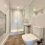 Modern bathroom with shower and toilet