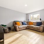 Modern living room with large corner sofa.