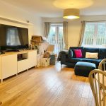 Modern living room with TV and sofa