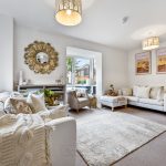 Stylish living room with modern decor and large windows.