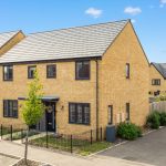 Modern semi-detached brick house with driveway